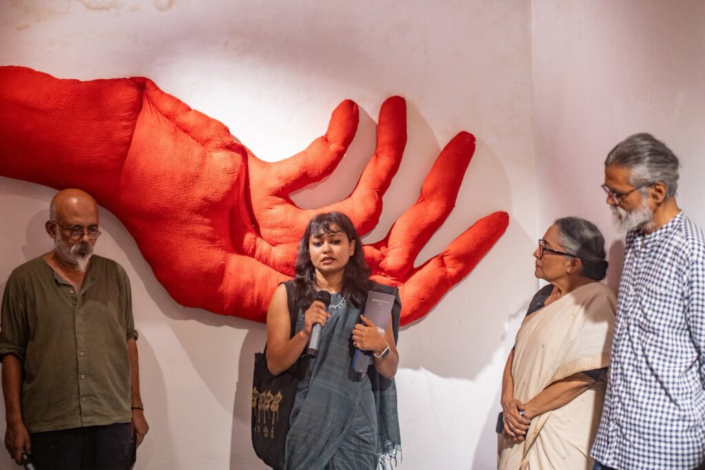 Motherhood has long been a subject in contemporary art, yet relatively few artists explore it as a process of bodily reconstruction, the rewriting of identity, and the politics of invisible labour. In her solo exhibition Fragmented yet Tangled: Living Within 2, artist Bubly Barna presents this complex experience through a compelling textile-based visual language. Held at Kalakendra in Lalmatia, the exhibition is far more than a collection of artworks—it offers a quiet yet powerful space for rethinking the body, memory, and identity of women.